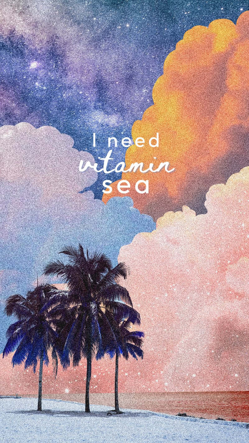  壁紙 — 棕櫚樹站在雪灘上，在星空下，有鮮豔的橙色和粉紅色雲朵，文字寫著「I need vitamin sea」。