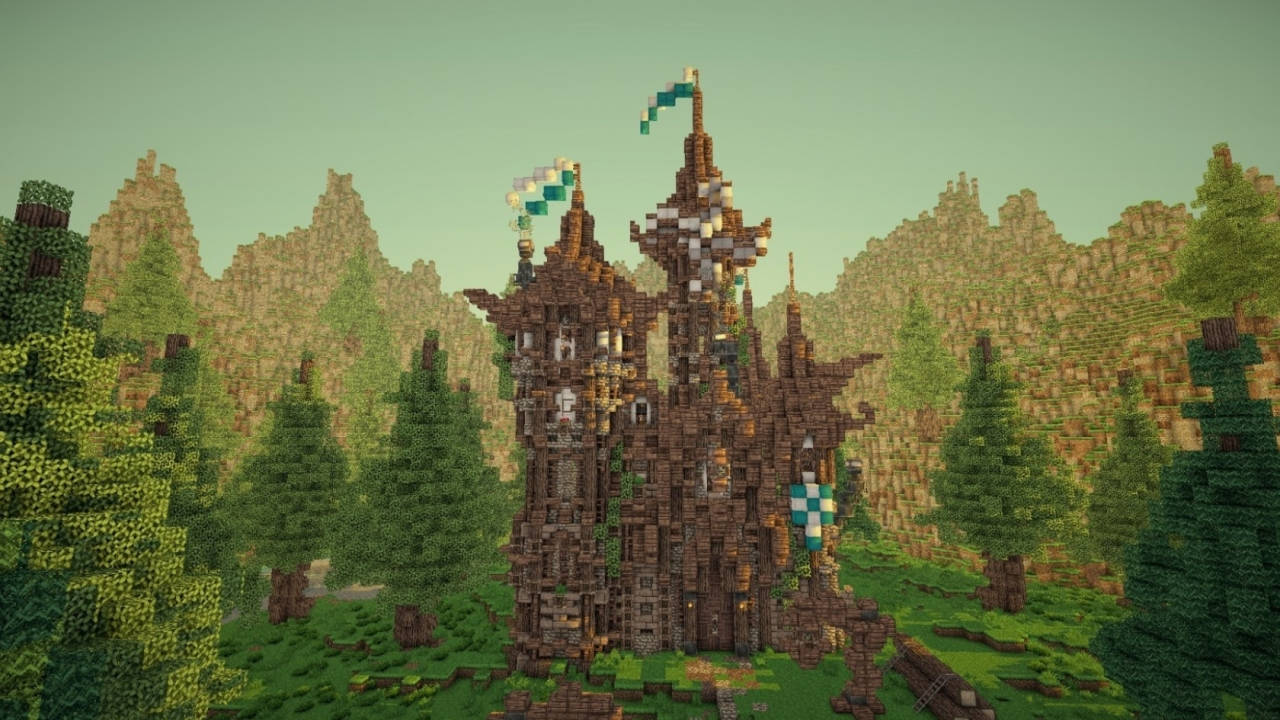 森林中的Minecraft城堡，帶有旗幟，背景有山脈。 — 最佳我的世界 壁紙