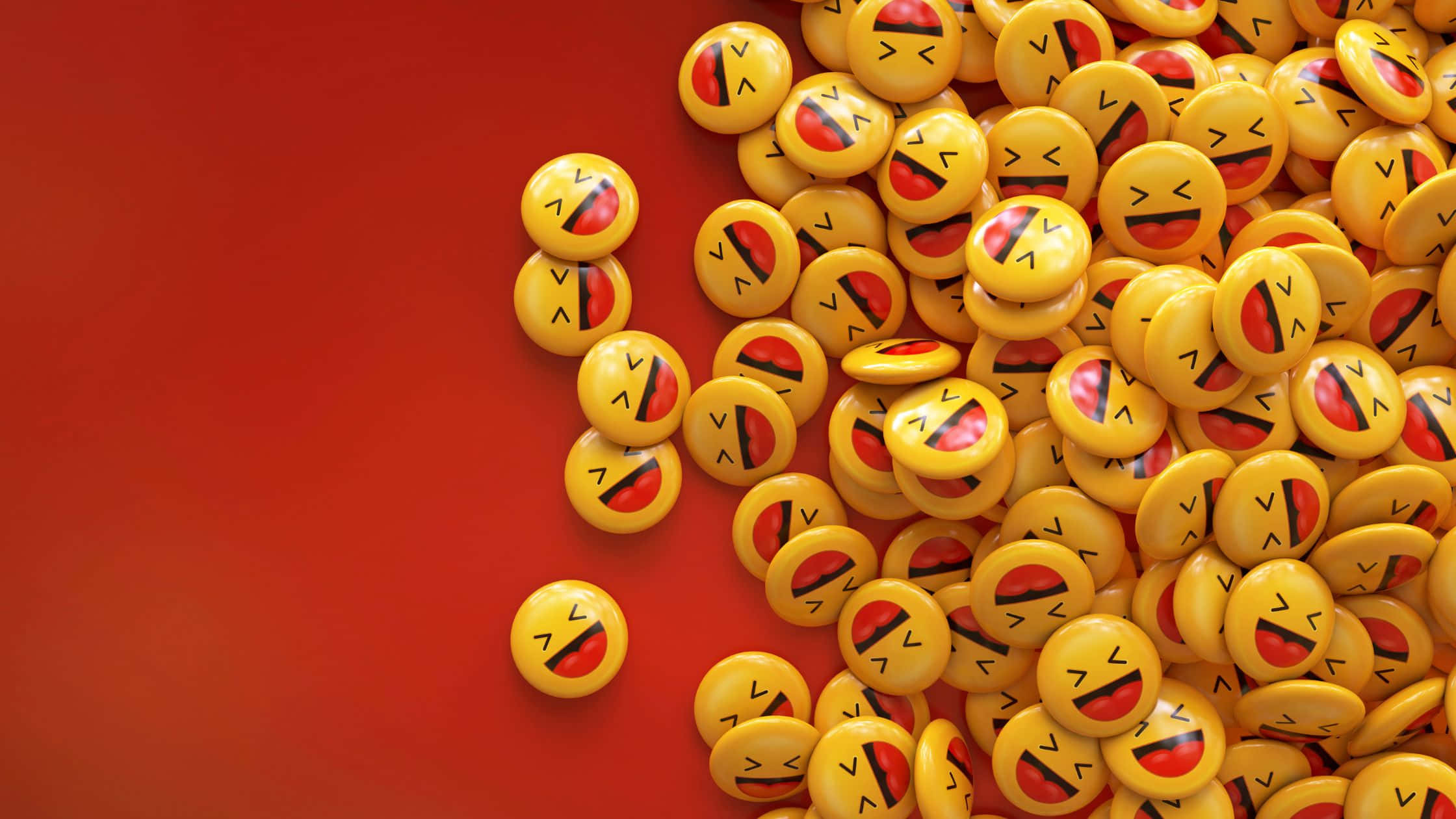 Smile 桌布 壁紙 — 一串黃色笑臉按鈕帶著頑皮的笑容，散落在鮮紅色的背景上。