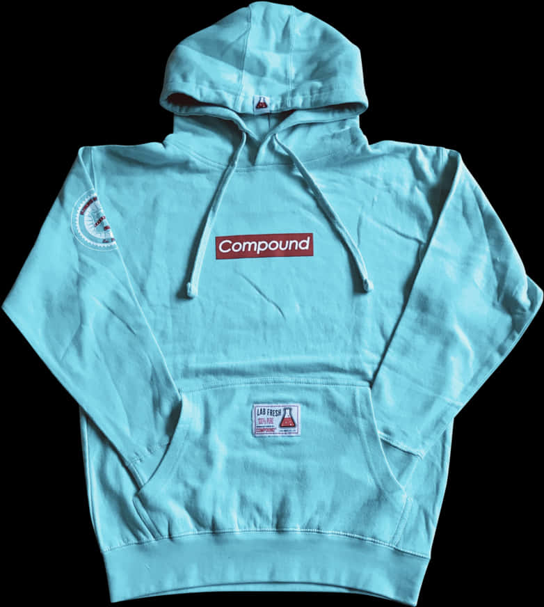Clothes 桌布 壁紙 — 一件淺藍色連帽上衣，帶有紅色 'Compound' 標誌和補丁，平放在黑色背景上。