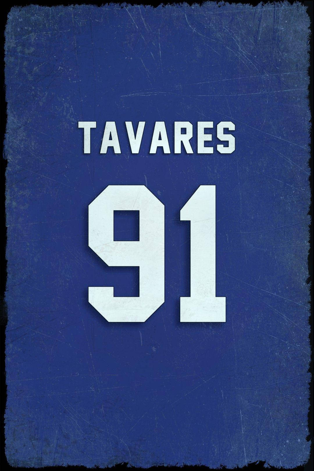 運動 桌布 壁紙 — 一件破舊的藍色運動球衣，帶有白色 'TAVARES 91' 文字，顯示刮痕和磨損邊緣。