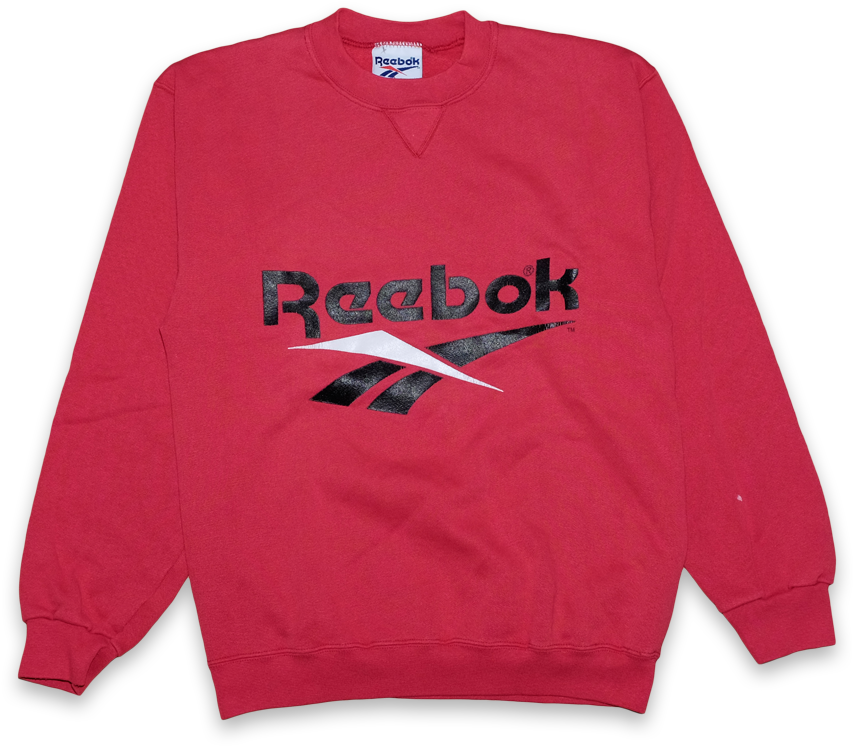 銳步 桌布 壁紙 — 一件鮮紅色的Reebok連帽衫，帶有醒目的黑色標誌，平放在純黑色背景上。