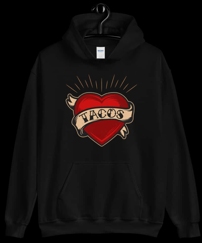 Heart Tattoo 桌布 壁紙 — 一件黑色連帽上衣掛在衣架上，展示一個大膽的刺青風格紅色愛心，附有寫著tacos的橫幅。