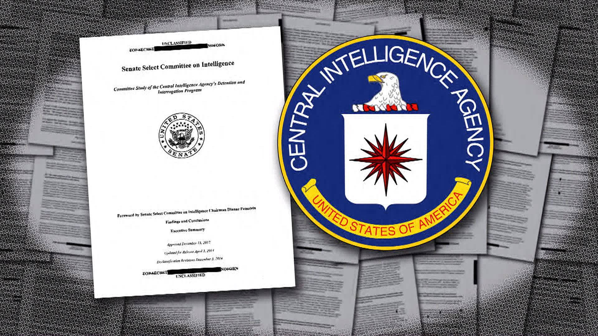 Cia 桌布 壁紙 — 一份來自參議院情報特別委員會的文件放在一堆文件上，中央情報局的印章顯眼地展示出來。