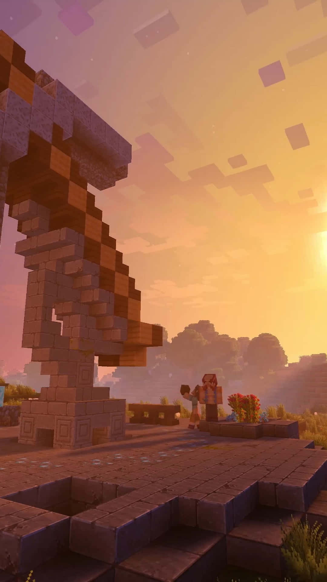 Minecraft Phone 桌布 壁紙 — 一位Minecraft玩家在金色日落時分站在一座高聳的像素結構前面，遠處有方塊樹木和天空。