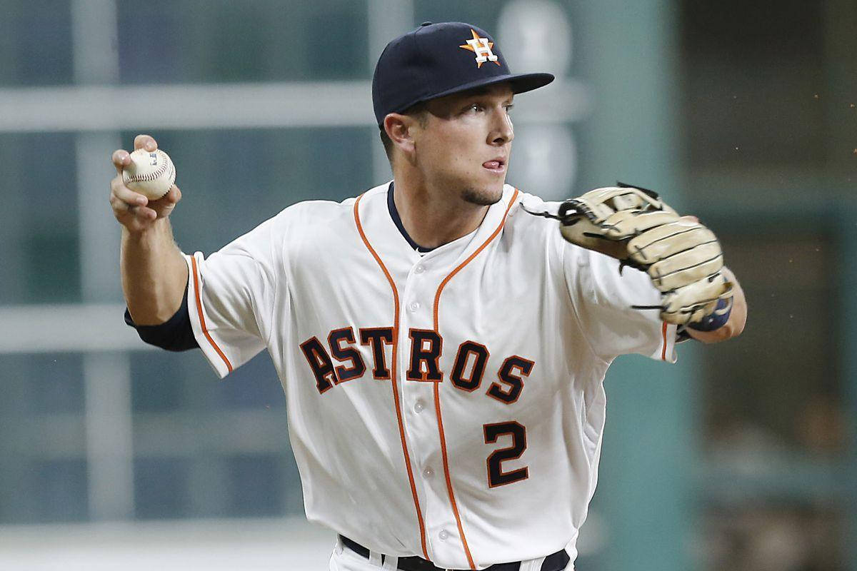 Bregman 桌布 壁紙 — 一位休士頓太空人棒球投手正在投球，身穿白色球衣，帶有橙色飾邊和背號二號。