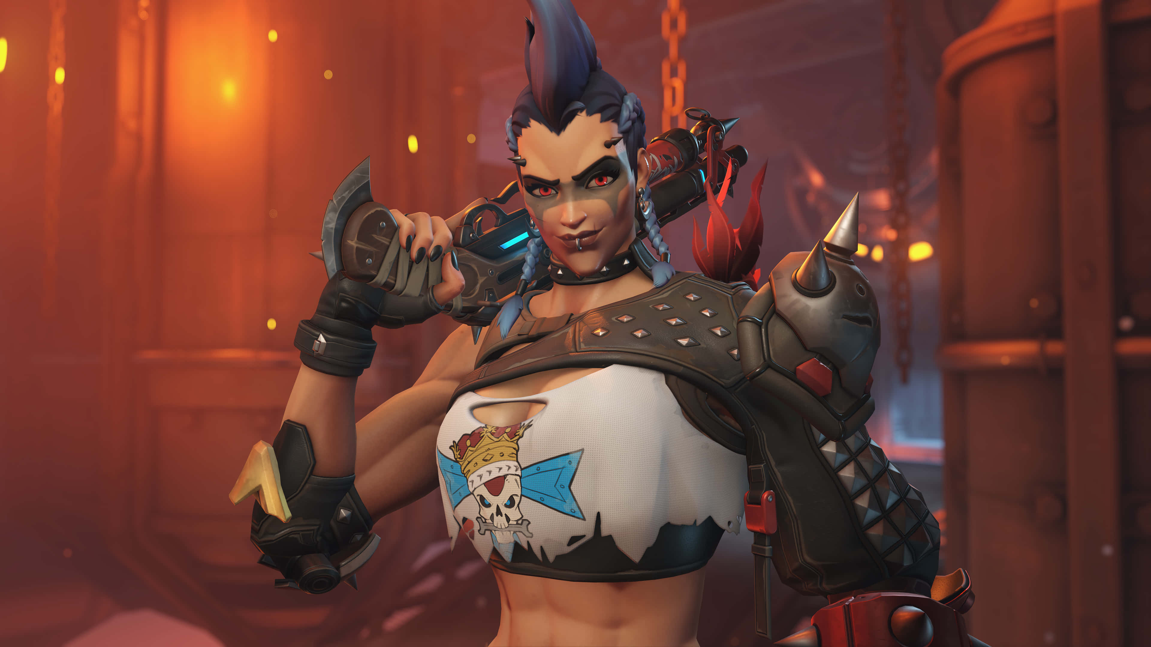 Overwatch Heroes 桌布 壁紙 — 一位兇猛的女戰士，藍色莫霍克頭和骷髏紋身，在昏暗的工業環境中揮舞著帶刺的武器。