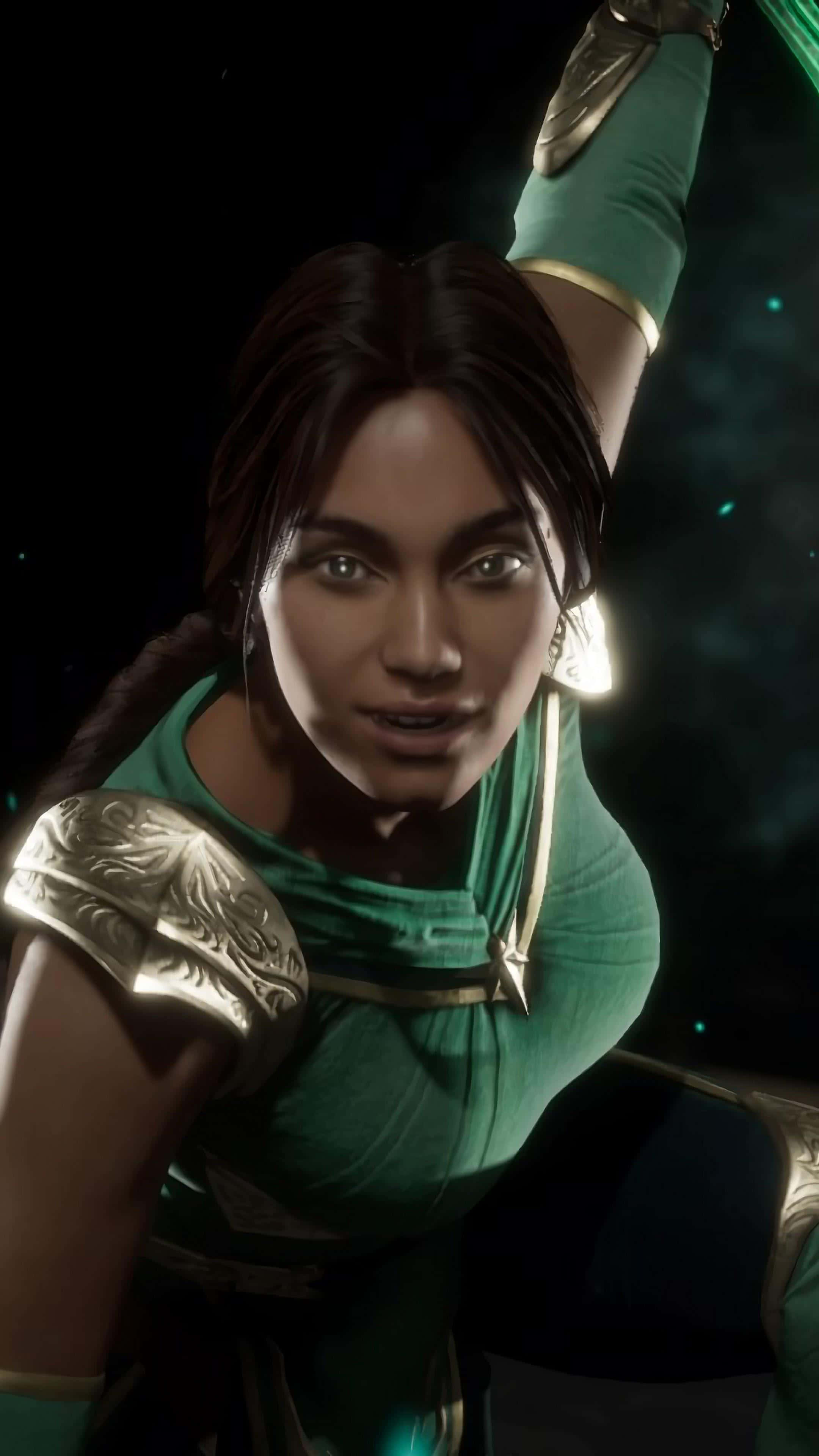Mortal Kombat Jade 桌布 壁紙 — 一位兇猛的女戰士身穿綠色盔甲，帶有發光裝飾，在黑暗的宇宙背景下擺出動感姿勢。