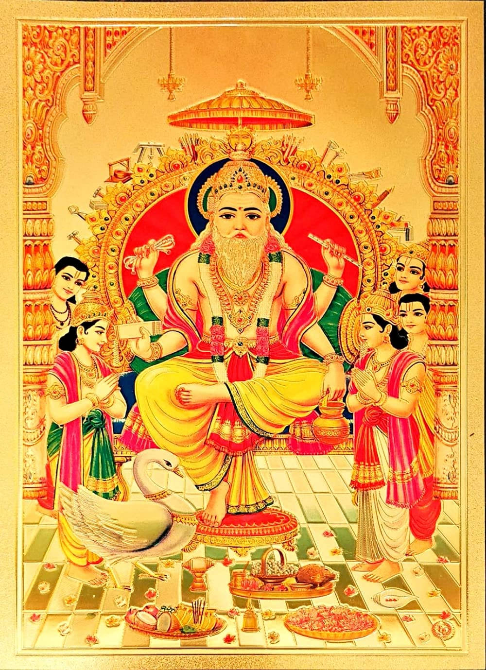 Vishwakarma 桌布 壁紙 — 一位光芒四射的印度教神祇，有多臂和長鬍鬚，坐在裝飾華麗的金色王座上，周圍有侍從和供品。