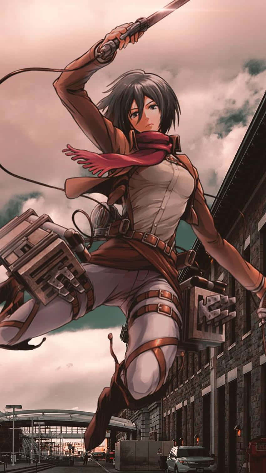 Mikasa Ackerman 桌布 壁紙 — 一位動漫戰士躍過城市景觀，揮舞著劍，紅色圍巾隨風飄揚。