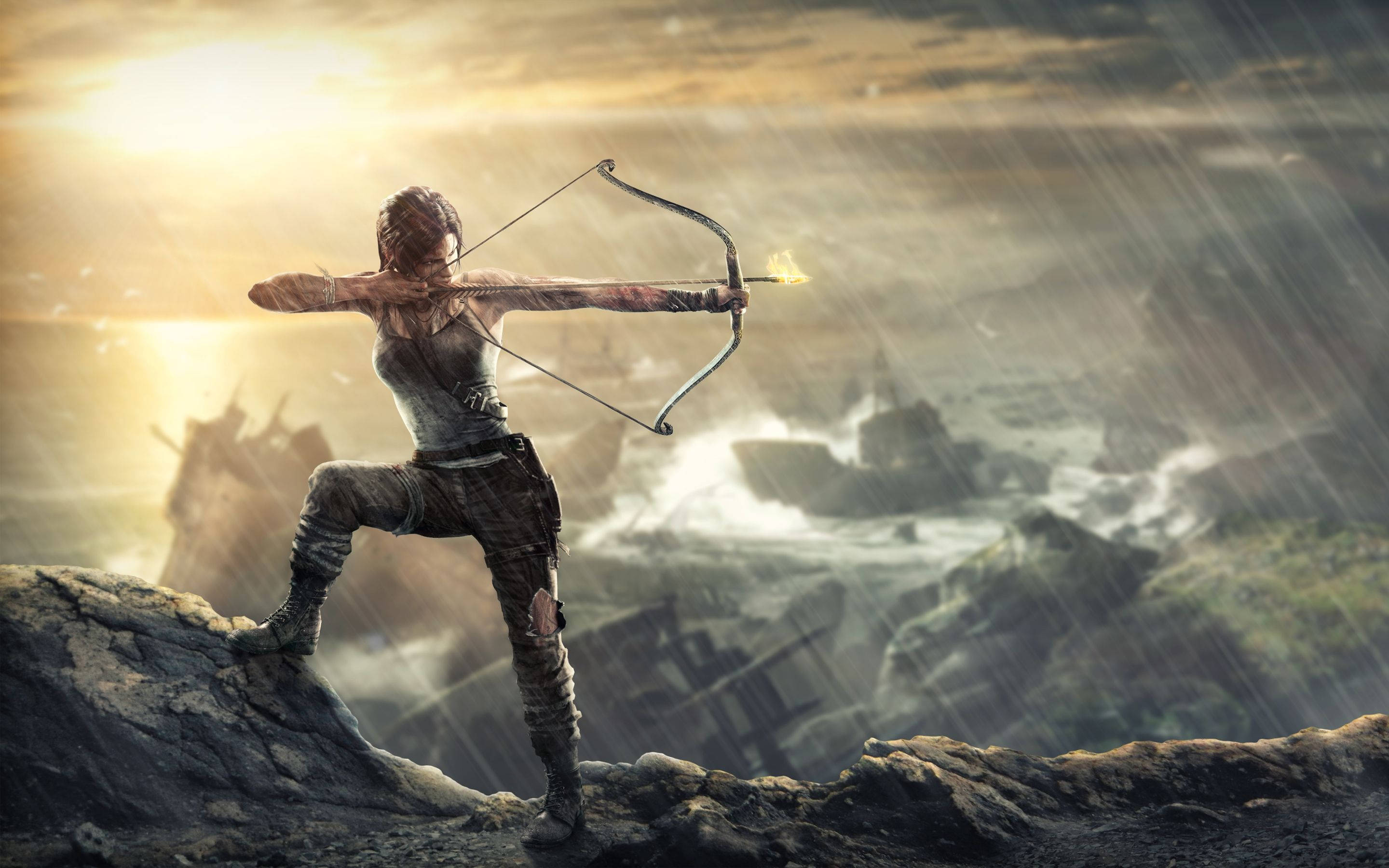 Archery 桌布 壁紙 — 一位女戰士在暴風雨的懸崖頂上拉開一把燃燒的弓，俯瞰日落時分的廢墟城市景觀。
