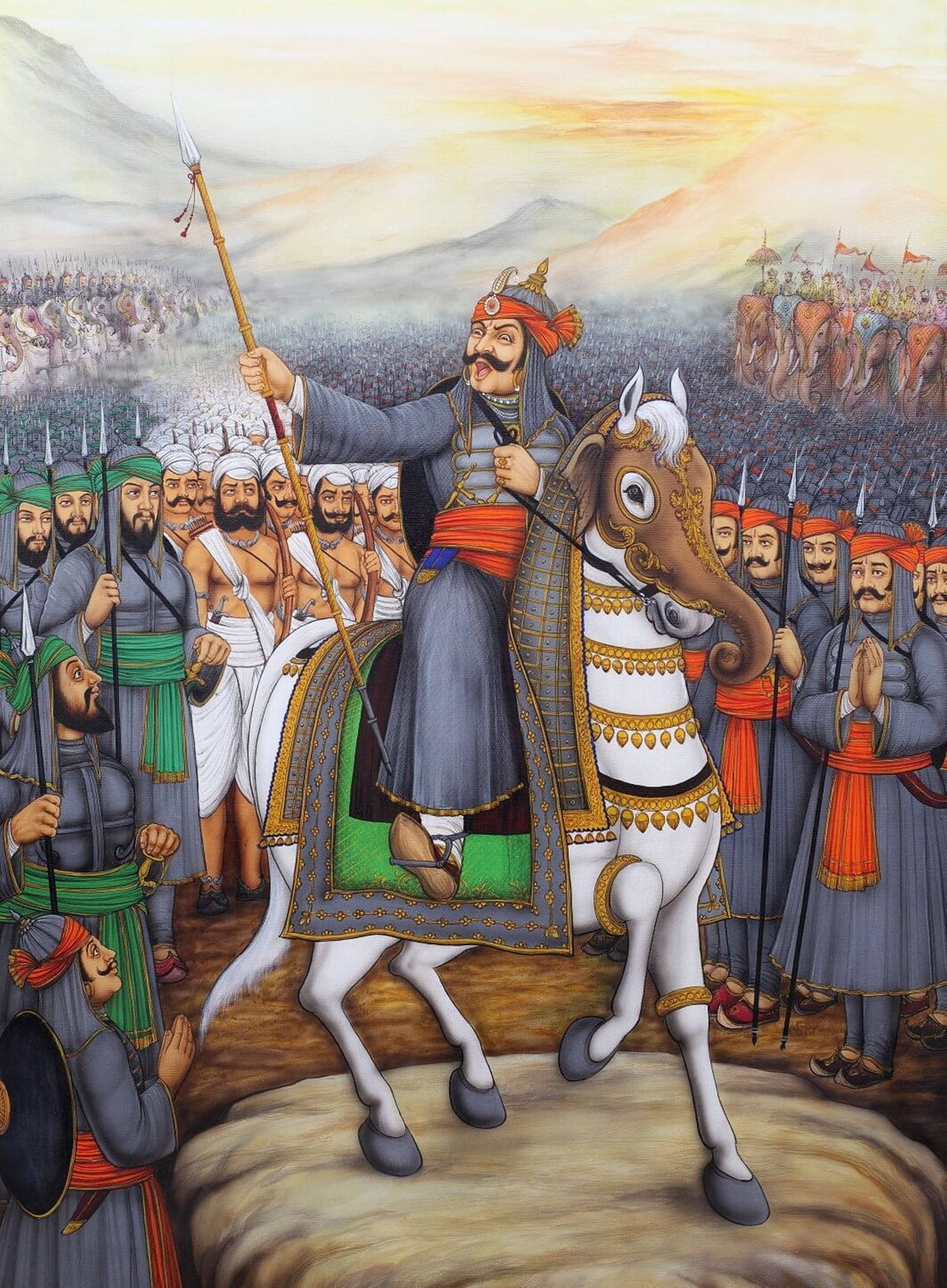Indian 桌布 壁紙 — 一位威風凜凜的戰士騎著白馬，在黎明時分帶領軍隊穿越多山的戰場，伴隨著大象和身著華麗服飾的士兵。