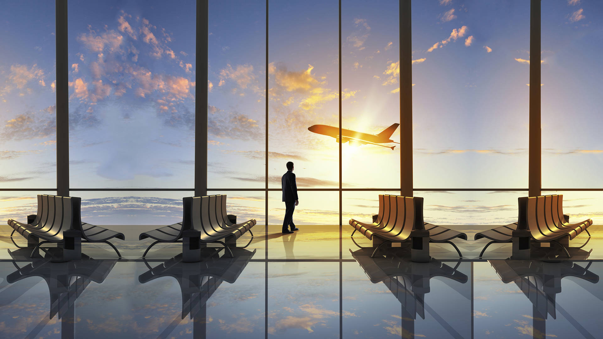 Airport 桌布 壁紙 — 一位孤獨的旅客站在機場航廈，透過落地窗觀看飛機在日落時分翱翔。