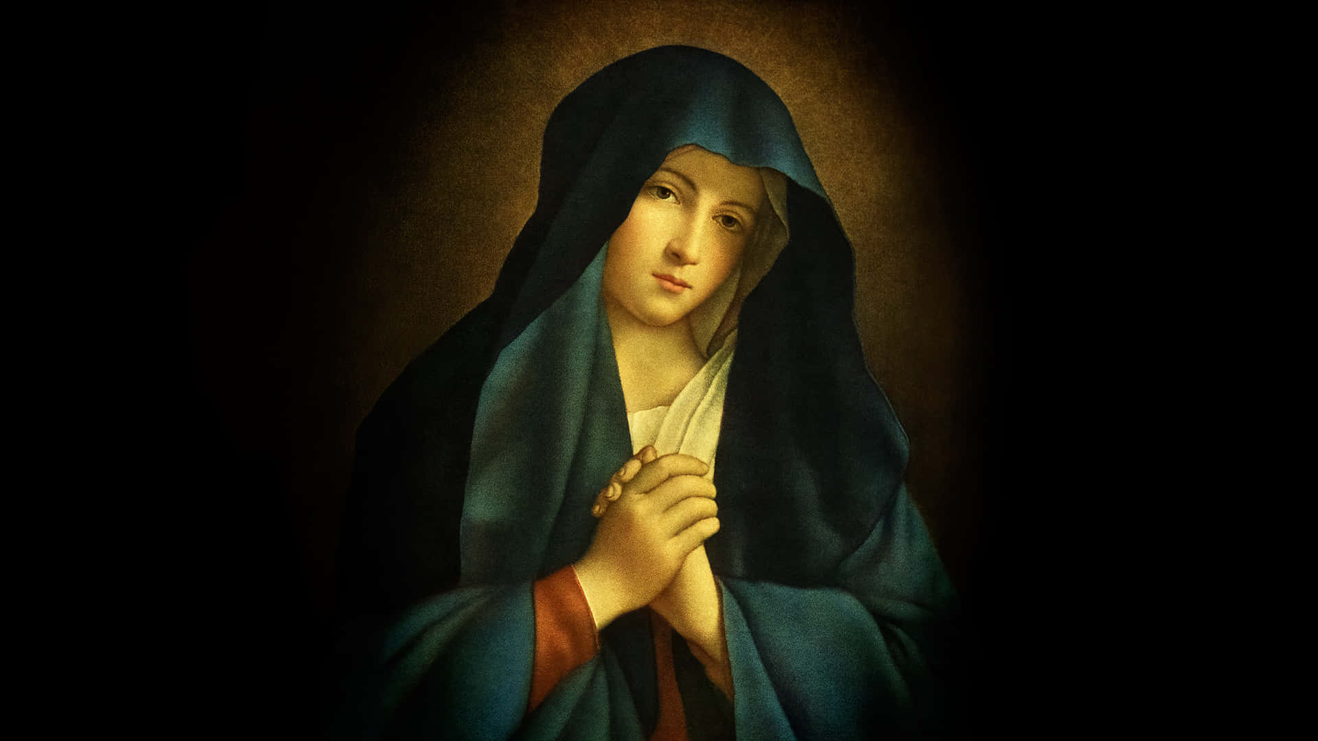 Catholic 桌布 壁紙 — 一位寧靜的女子，身披深藍色面紗，在黑暗柔和的光線背景下合十祈禱。