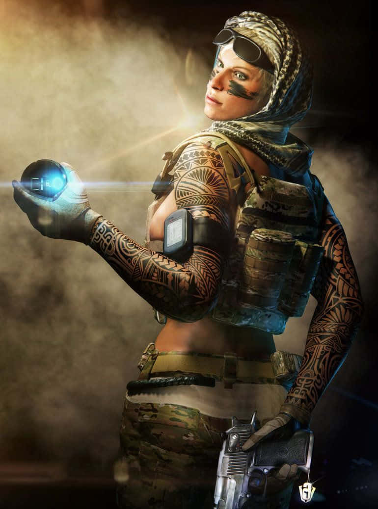 Rainbow Six Siege Valkyrie 桌布 壁紙 — 一位帶有部落紋身和戰術裝備的兇猛女兵，在煙霧繚繞的背景中手持發光球體和手槍。