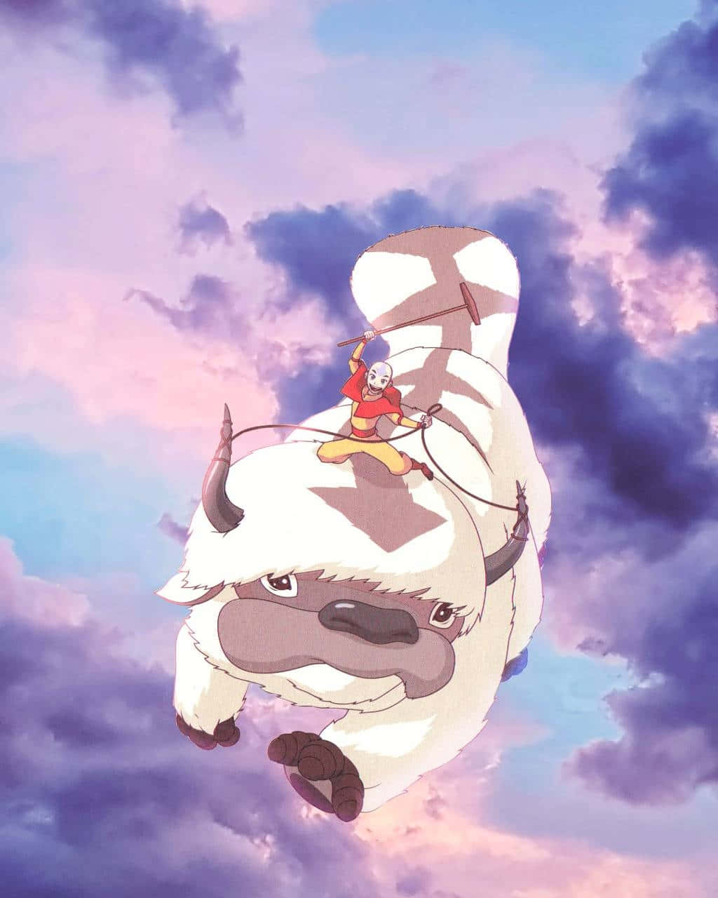 Appa Avatar 桌布 壁紙 — 一位年輕僧侶騎著飛行的野牛，穿過充滿柔軟雲朵的夢幻紫色和粉紅色天空。