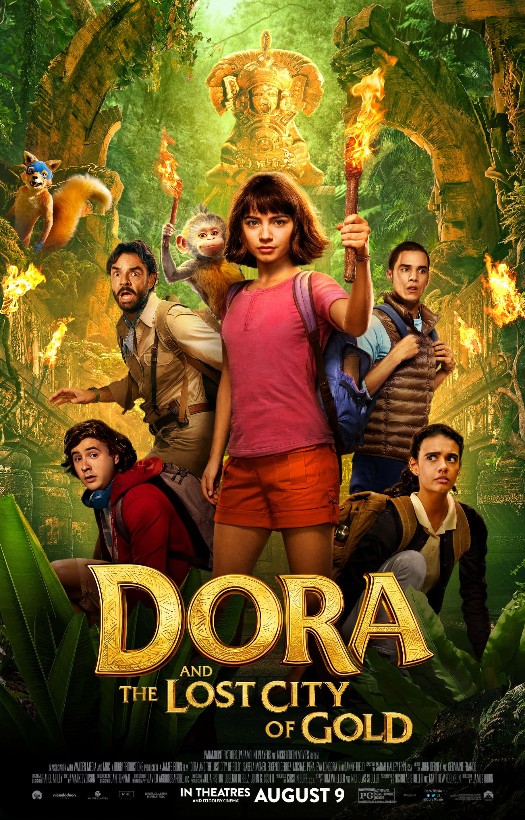 Dora 桌布 壁紙 — 一位年輕探險家帶領一群人穿過茂密的叢林神廟，火把和古老的金色雕像在迷霧中閃耀。