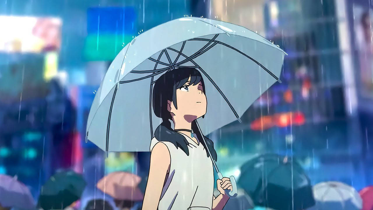 Makoto Shinkai 桌布 壁紙 — 一位年輕的動漫女孩，深色頭髮，在夜晚雨中霓虹燈閃爍的城市街道上，手持淺藍色雨傘。