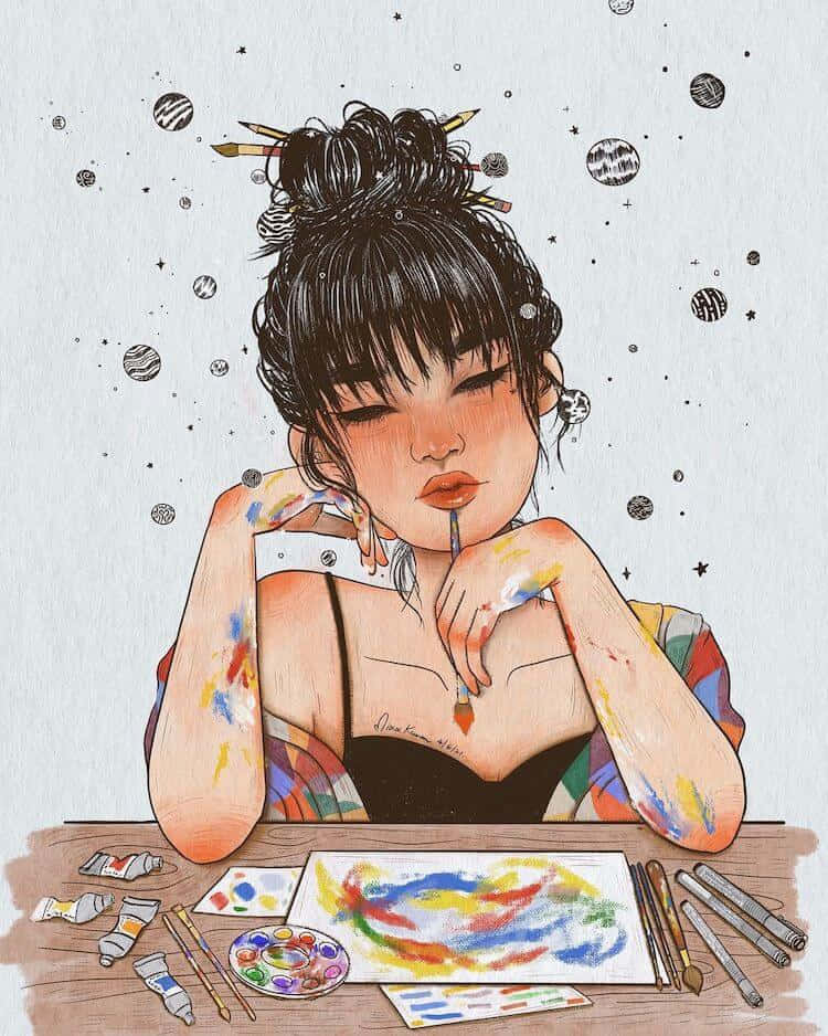 美學藝術 桌布 壁紙 — 一位年輕藝術家，手臂沾滿顏料，托腮沉思，周圍環繞著藝術用品和漂浮的行星。