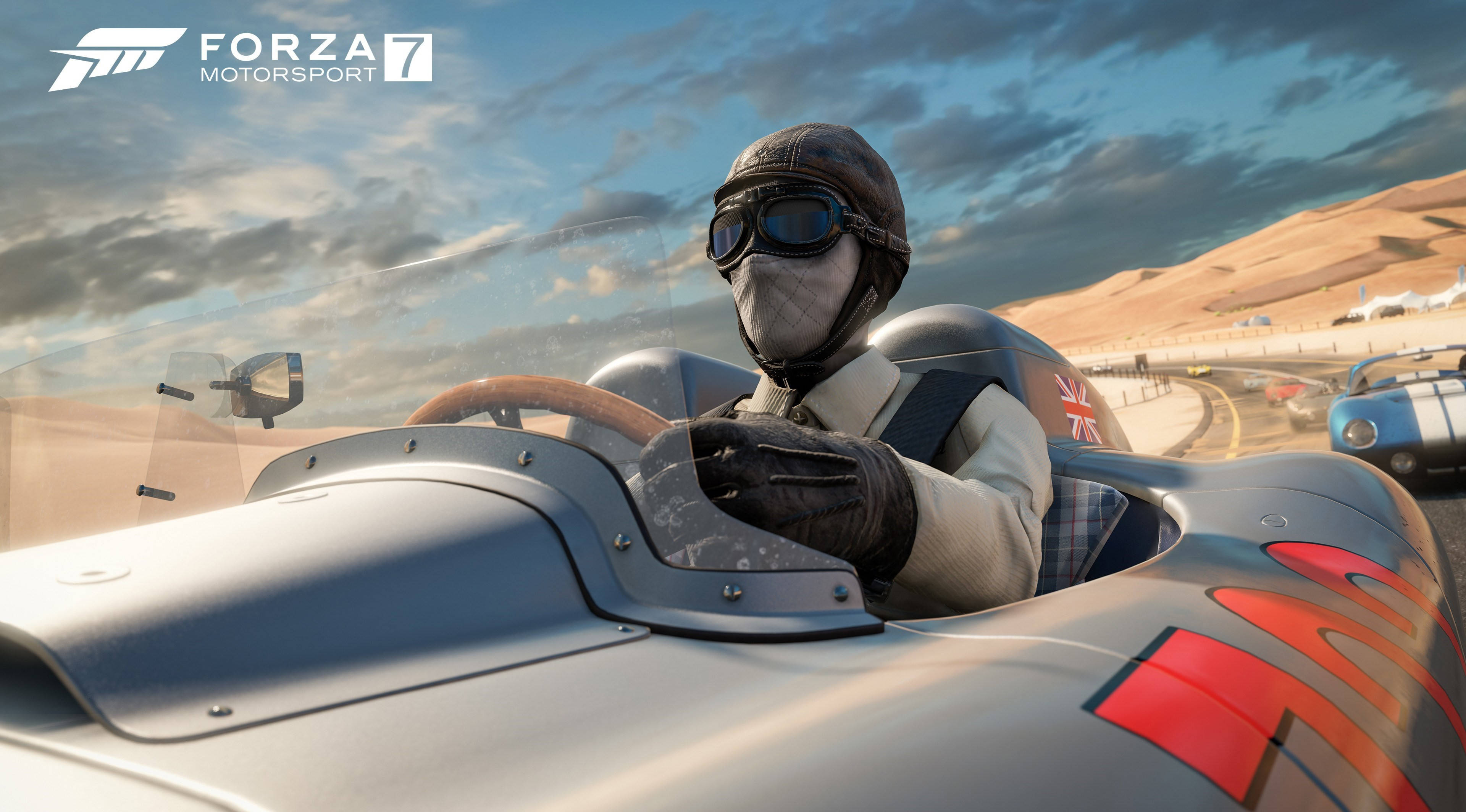 Motorsport 桌布 壁紙 — 一位復古賽車手穿著時代裝備，在《極限競速7》中戲劇性的天空下穿越沙漠賽道。