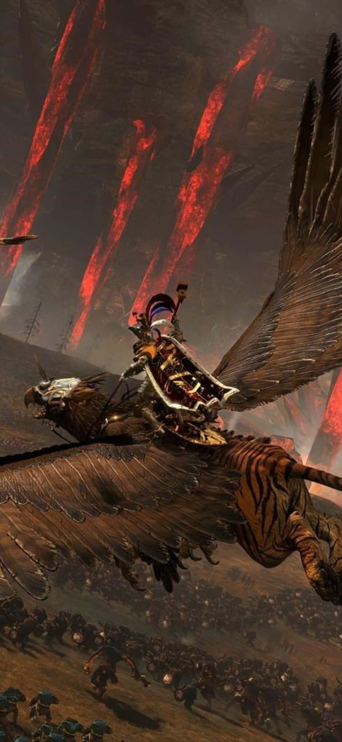iPhone X Total War Warhammer 桌布 壁紙 — 一位戰士騎著巨大的有翼老虎穿過火熱的天空，下方軍隊在戲劇性的奇幻戰鬥中交戰。