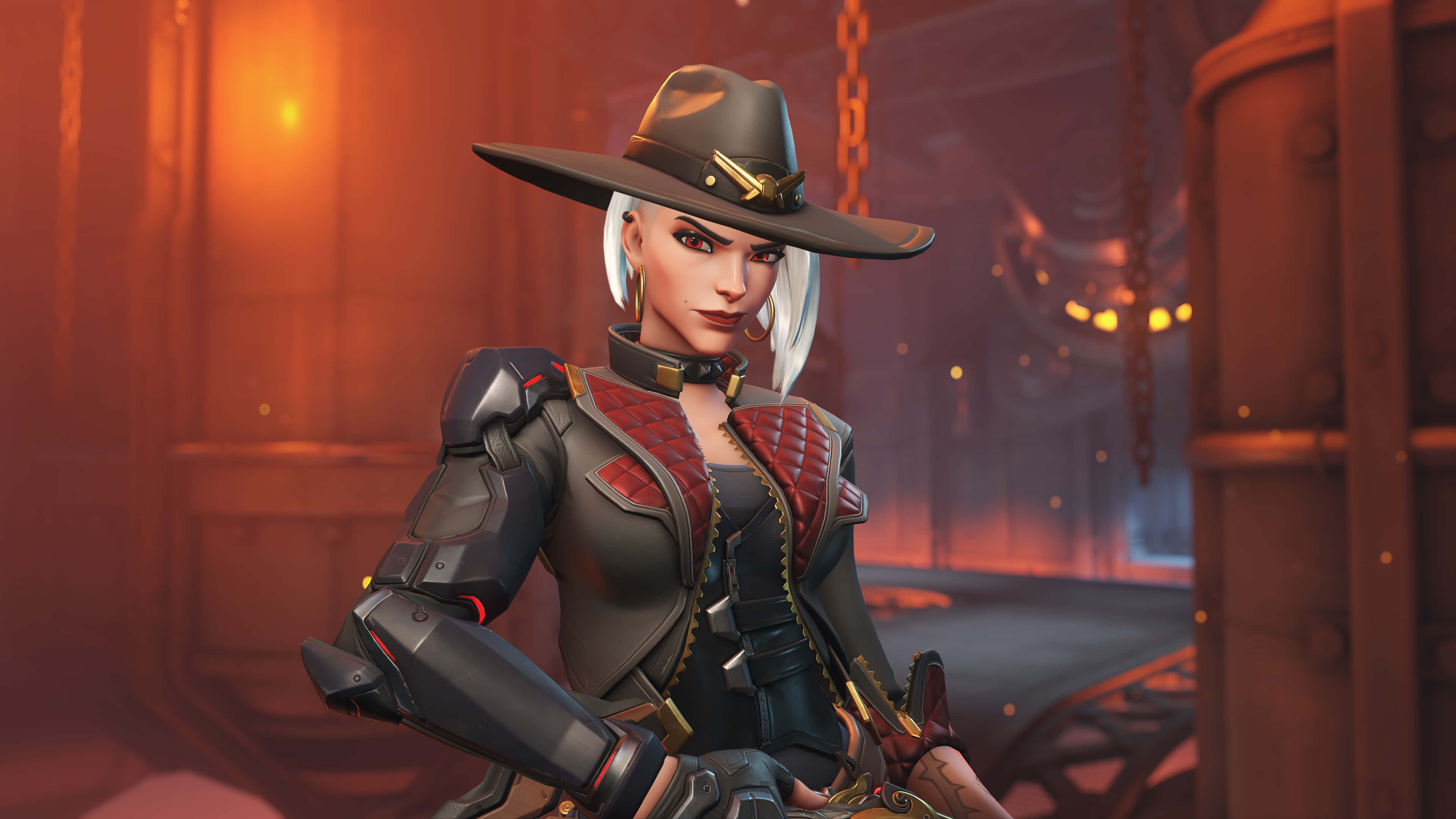 Overwatch Heroes 桌布 壁紙 — 一位戴著寬邊帽、身穿盔甲的兇猛女戰士自信地站在光線昏暗的工業環境中，伴隨著溫暖的橙色燈光。