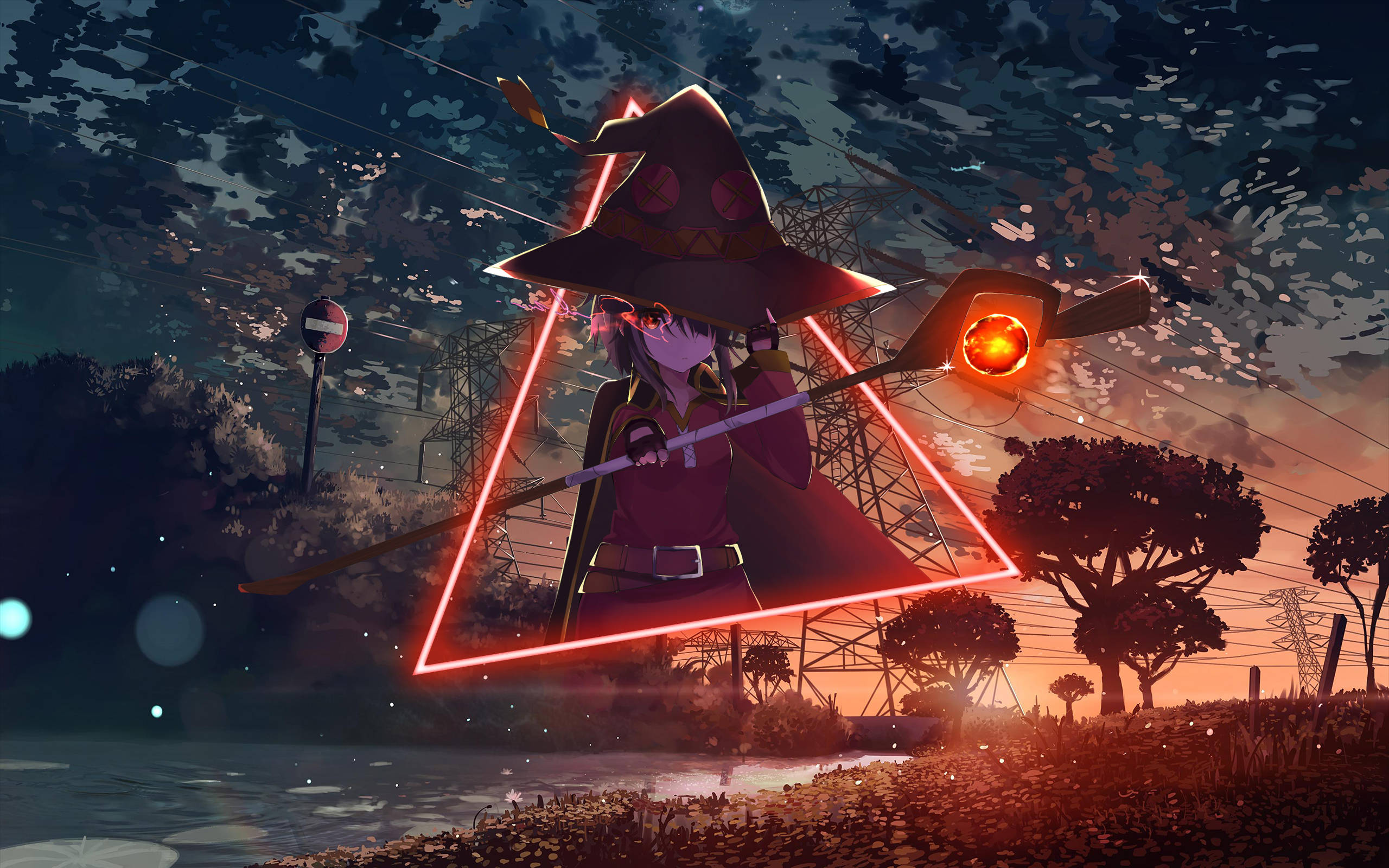 Megumin 桌布 壁紙 — 一位戴著寬邊帽的女巫，在紅色三角形光環內揮舞著發光的法杖，背景是暮色天空，有電線和樹木。