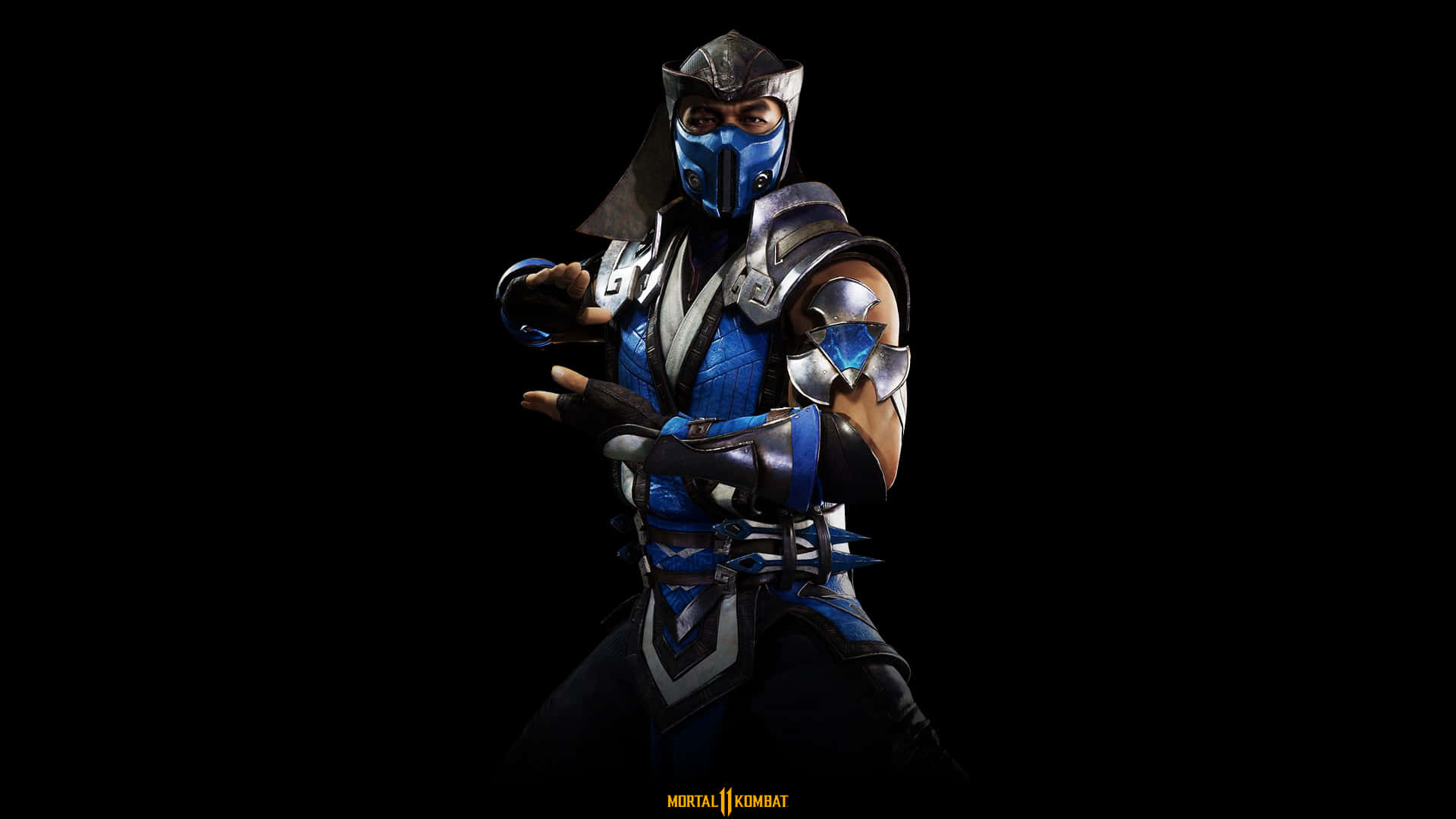 Mortal Kombat Sub-zero 桌布 壁紙 — 一位戴著藍色面具的武術家，身穿裝甲戰鬥裝備，在純黑背景下擺出動感姿勢。