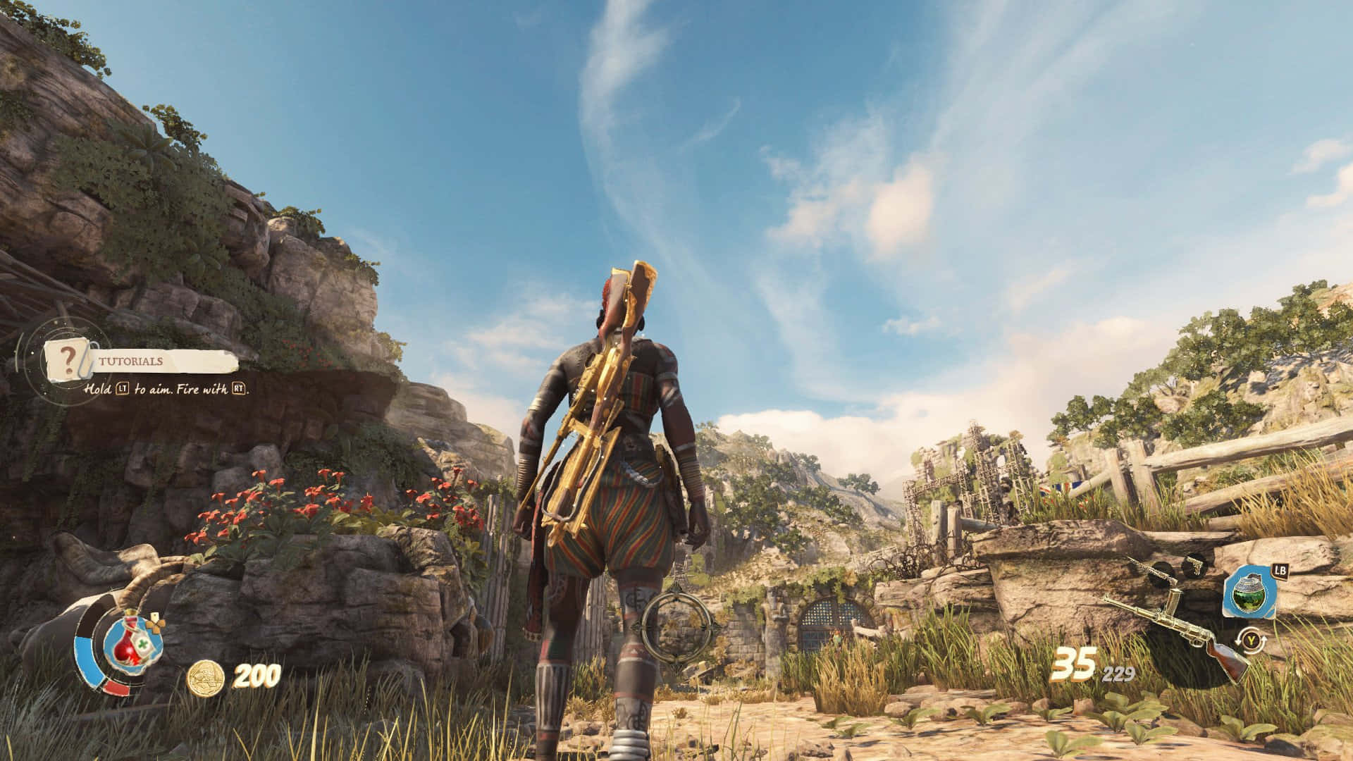 1920x1080 Strange Brigade 桌布 壁紙 — 一位手持弓箭的戰士站在陽光明媚的岩石小徑上，周圍是茂密的山地景觀，點綴著遺跡和野花。