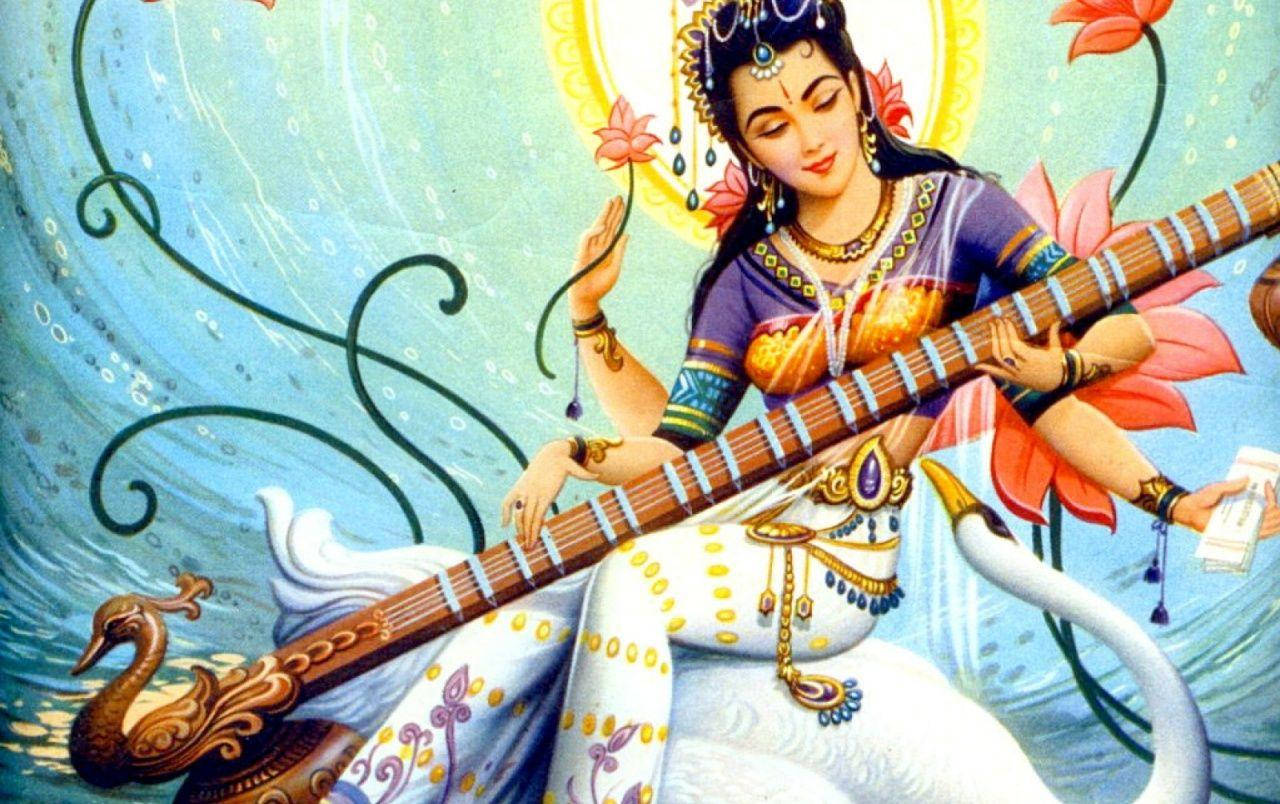 Saraswati 桌布 壁紙 — 一位擁有四臂的神聖女神坐在一隻白天鵝上，彈奏著天鵝頸西塔琴，背景是旋轉的藍色和金色宇宙。