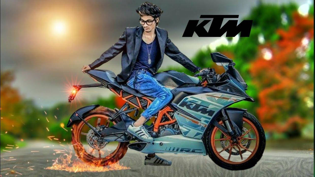 KTM 摩托車 桌布 壁紙 — 一位時尚年輕男子騎著KTM機車，後輪飛出火花，背景是日落。