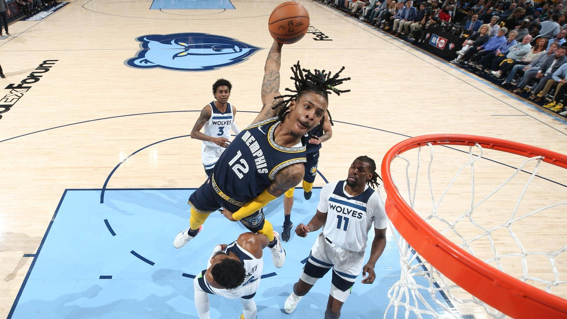 曼菲斯灰熊球員在NBA比賽中灌籃。 — Ja Morant 動圖 壁紙