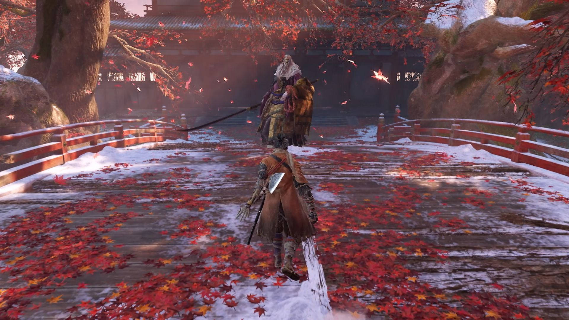 武士在雪橋上行走，背景是日本神社的紅楓樹。 — 隻狼：暗影雙死 壁紙