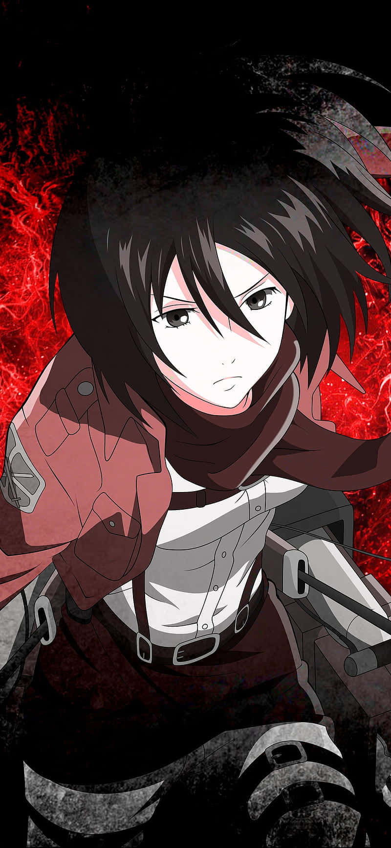 Mikasa Ackerman 桌布 壁紙 — 一位決心堅定的動漫戰士，黑髮紅圍巾，身穿戰術裝備，站在火紅背景前。