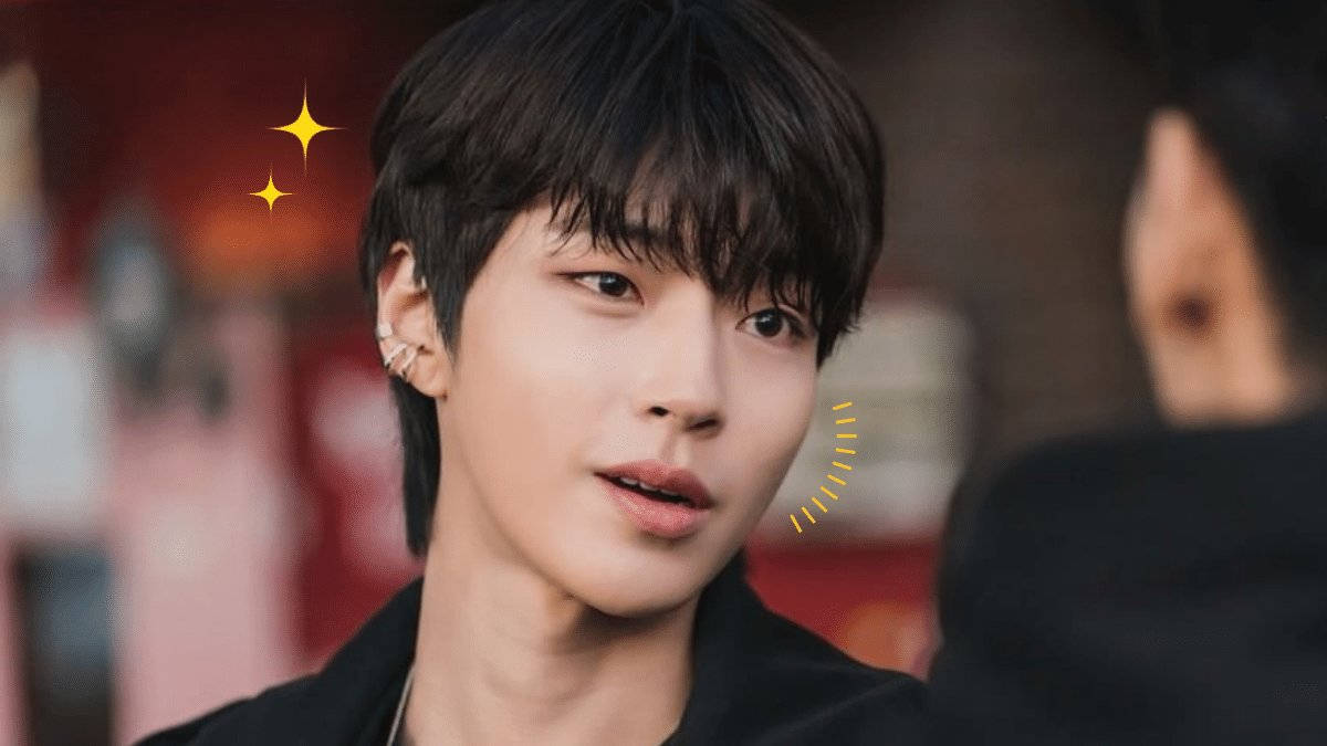 Hwang In Yeop 桌布 壁紙 — 一位深色頭髮和耳環的年輕男子沉思地凝視著，同時閃光和聲波在他的頭部周圍動畫化。