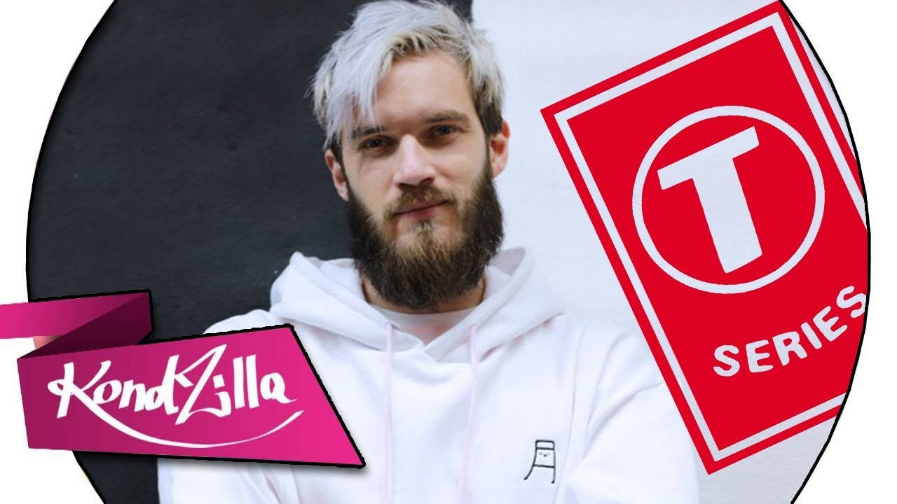 YouTube Banner 桌布 壁紙 — 一位留鬍子、白髮的男人穿著白色連帽衫，旁邊有紅色T Series標誌和粉紅色KendZilla橫幅。