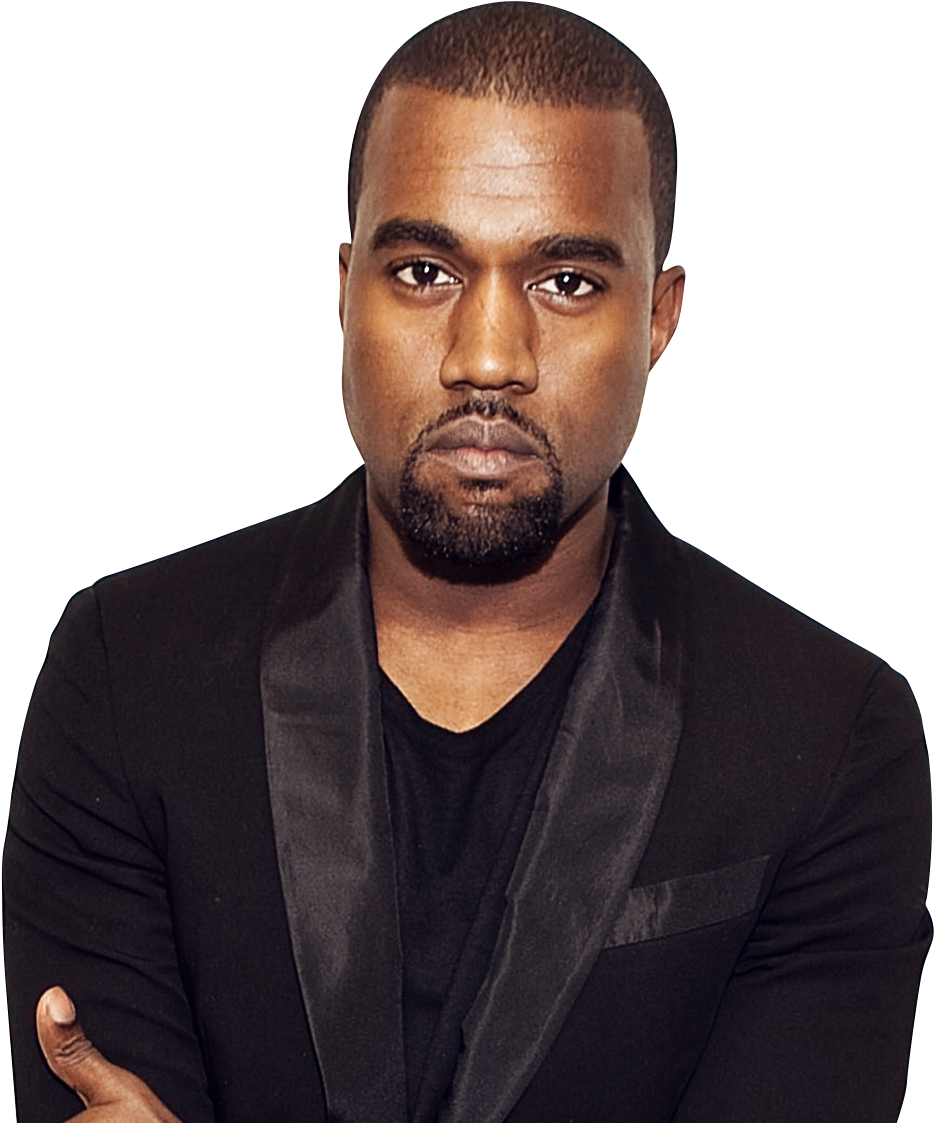 Kanye 桌布 壁紙 — 一位留鬍子短髮的男子，在純黑色背景前，穿著黑色西裝外套內搭黑色襯衫。