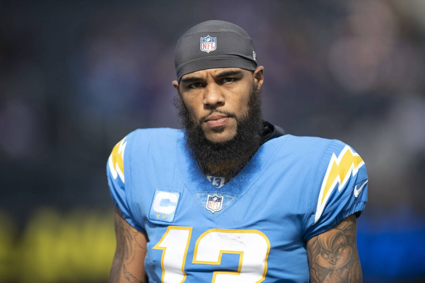 穿著藍色12號球衣和帽子的NFL足球運動員 — 人像動態 壁紙