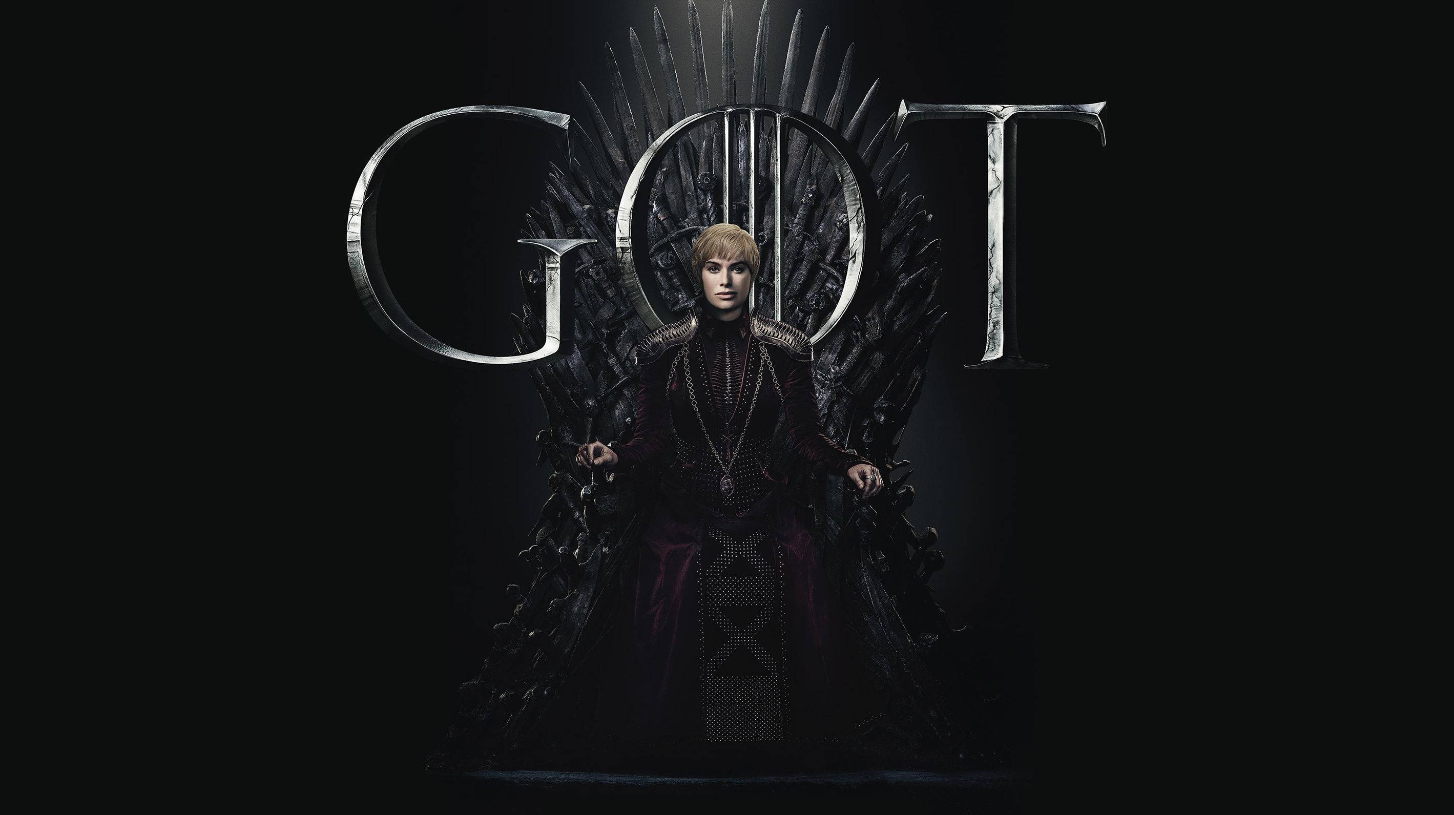 cersei lannister 桌布 壁紙 — 一位皇室人物坐在鐵王座上，背後有發光的「GOT」字母，場景黑暗如電影。