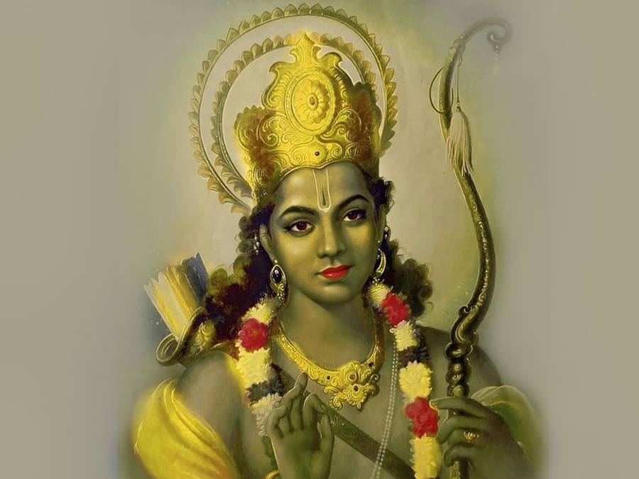 Hindu God 桌布 壁紙 — 一位神聖人物佩戴金色皇冠和珠寶，手持弓箭，頸部和肩部掛著花環。