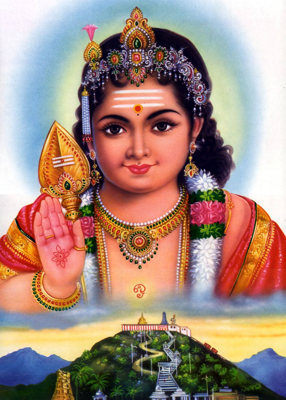 Hindu Temple 桌布 壁紙 — 一位神聖的兒童神祇，裝飾著鮮豔的珠寶和花環，在寺廟頂峰的山景上方賜福。