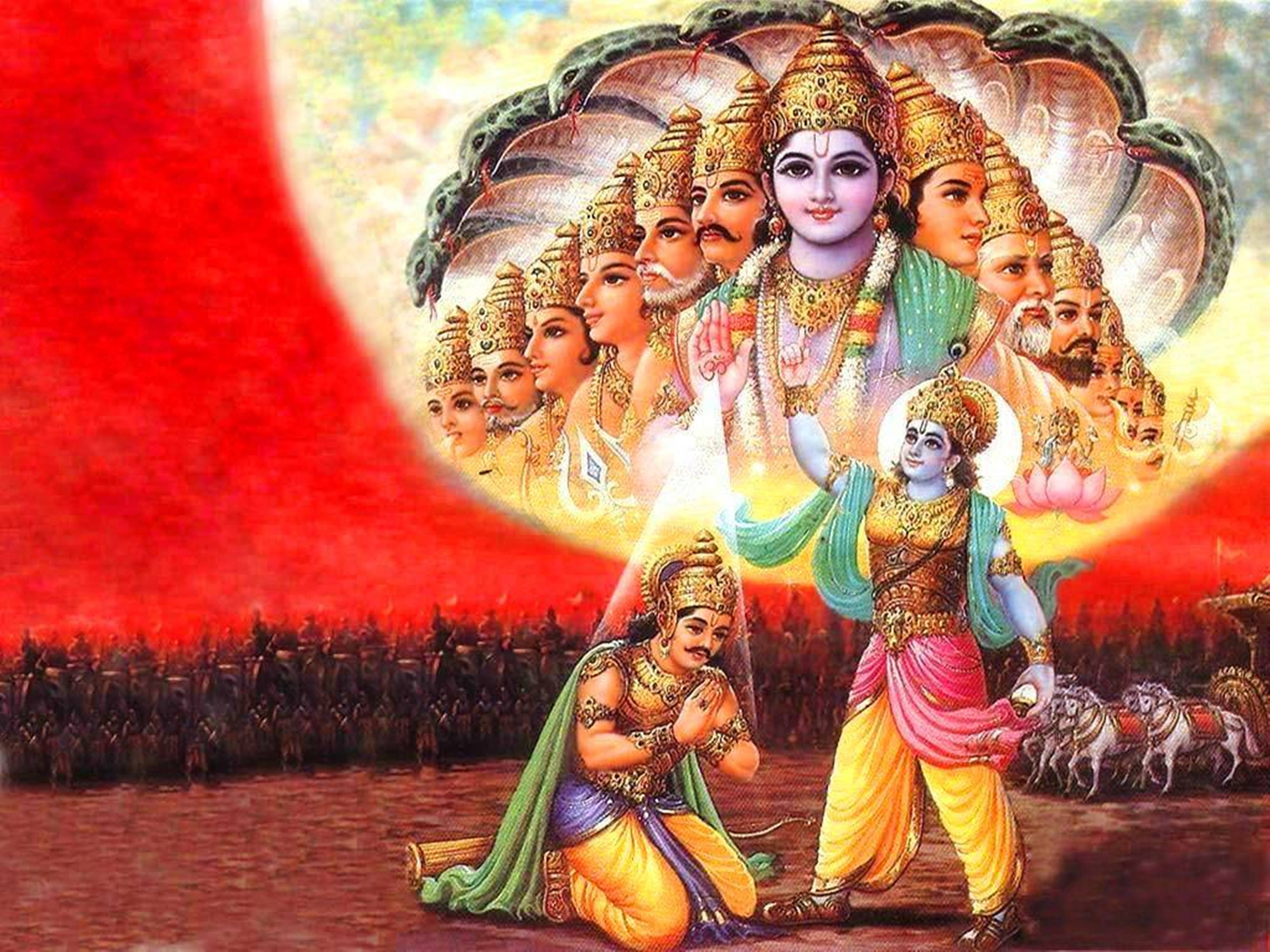 Mahabharat Krishna 桌布 壁紙 — 一位神聖的印度教神祇，擁有多個頭顱和蛇冠，光芒四射地站立在跪拜的信徒和戰士之上，背景是火紅色的。