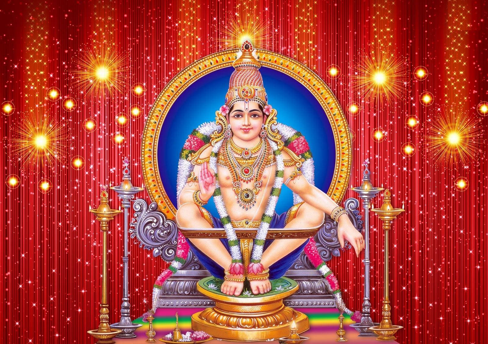 Ayyappa 桌布 壁紙 — 一位神聖的神祇安詳地坐在裝飾著鮮花和珠寶的金色寶座上，背景是閃耀的紅色帷幕和發光的燈光。