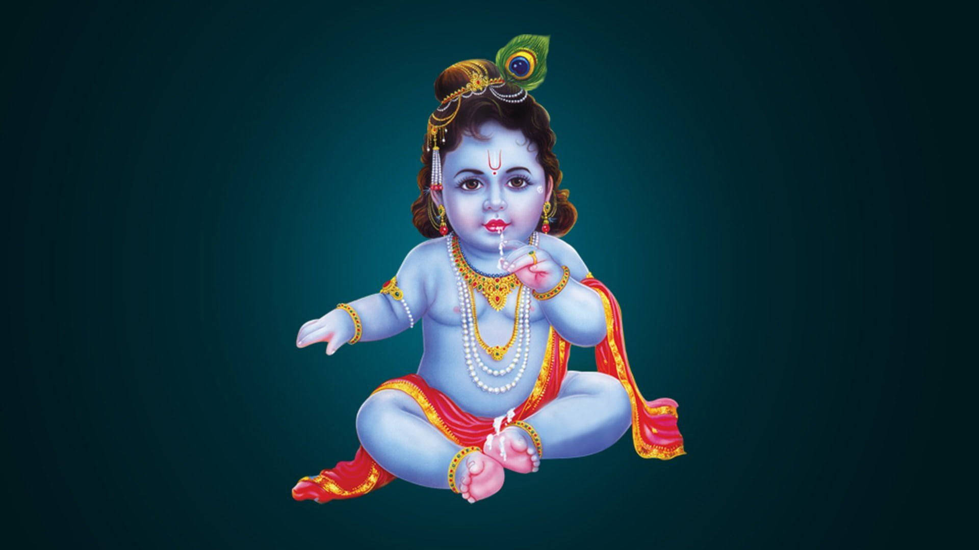 little krishna HD 桌布 壁紙 — 一位神聖的藍皮膚嬰兒神祇，飾有黃金珠寶和孔雀羽毛，在深藍綠色背景下盤腿而坐。