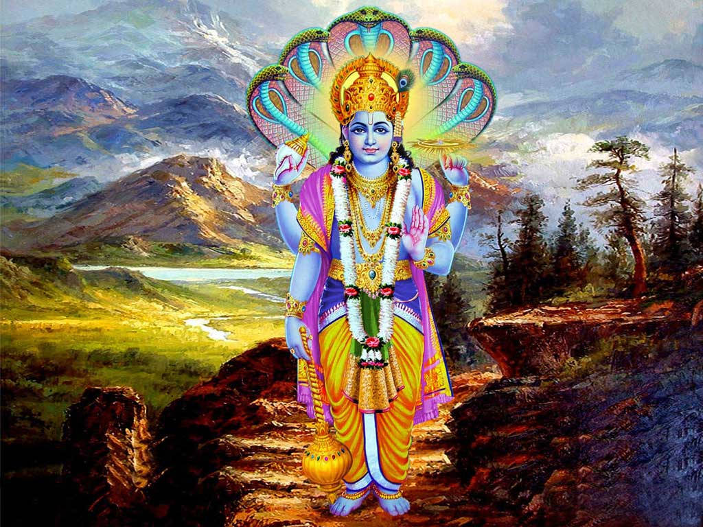 Vishnu 桌布 壁紙 — 一位神聖的藍皮膚神祇戴著多頭蛇冠，威嚴地站在俯瞰山谷的山脊上。