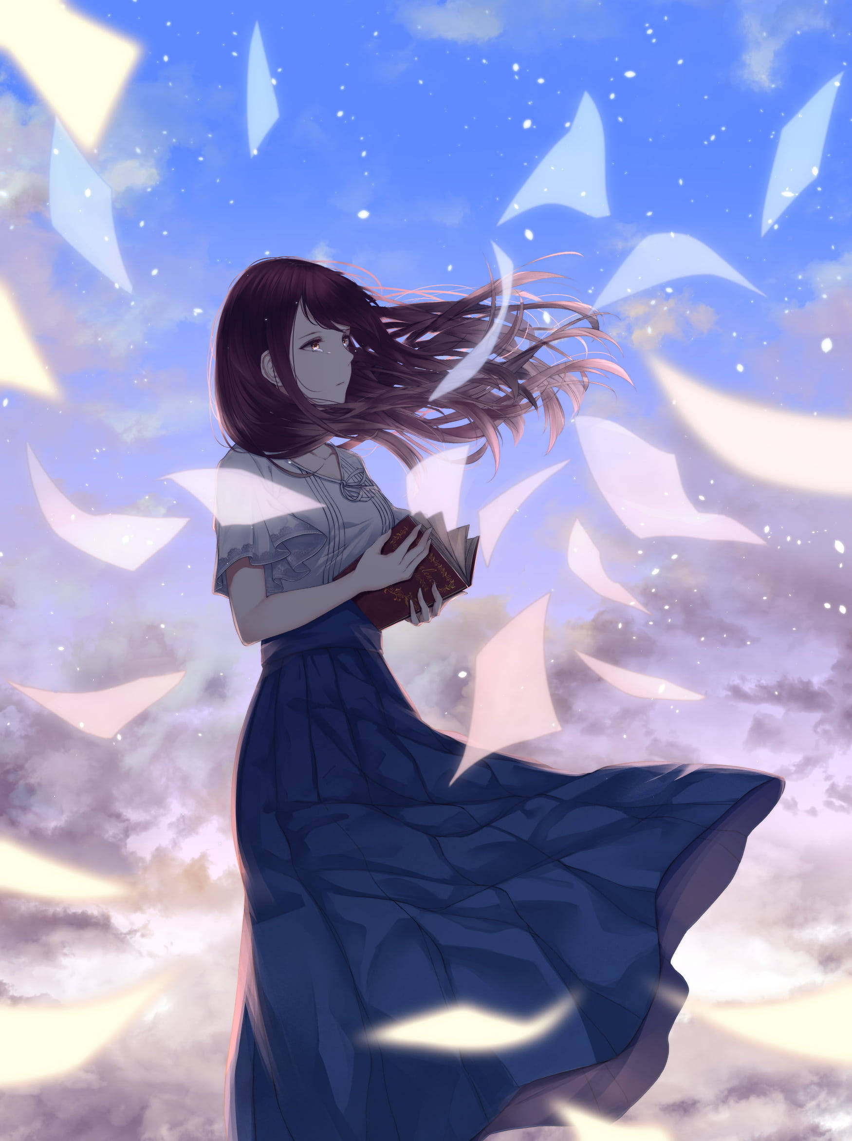 aesthetic sad anime girl 桌布 壁紙 — 一位穿著藍色連衣裙的年輕動漫女孩拿著一本書，發光的紙片在她周圍的夢幻天空中旋轉。