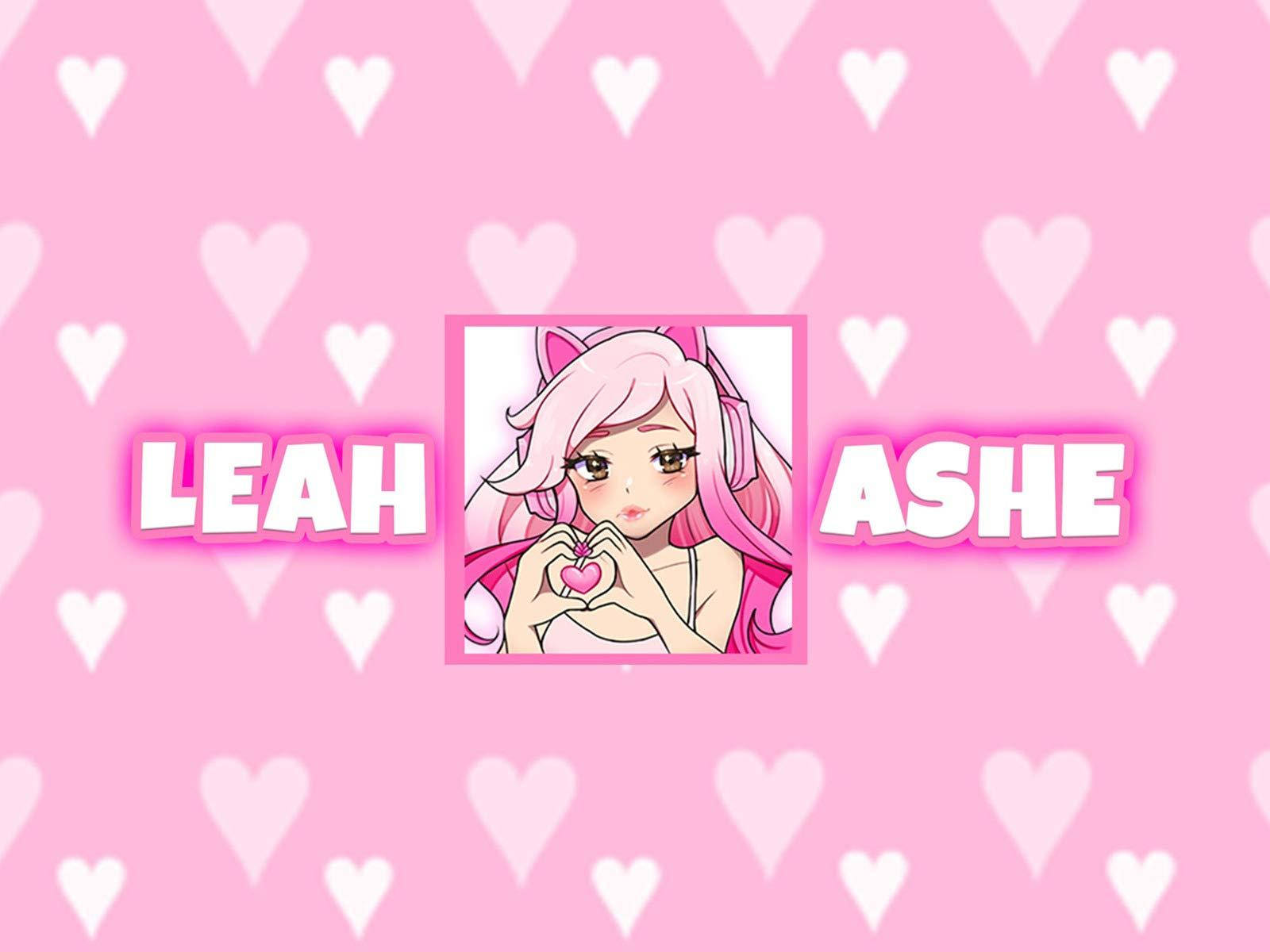 Leah Ashe 桌布 壁紙 — 一位粉紅色頭髮的動漫女孩在粉紅色愛心圖案背景上，用雙手在Leah和Ashe名字之間形成一個愛心。