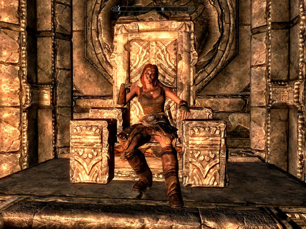 Aela The Huntress 桌布 壁紙 — 一位紅髮戰士端莊地坐在裝飾華麗的石製王座上，身處燈光昏暗的古老神廟，周圍有發光的金色點綴。