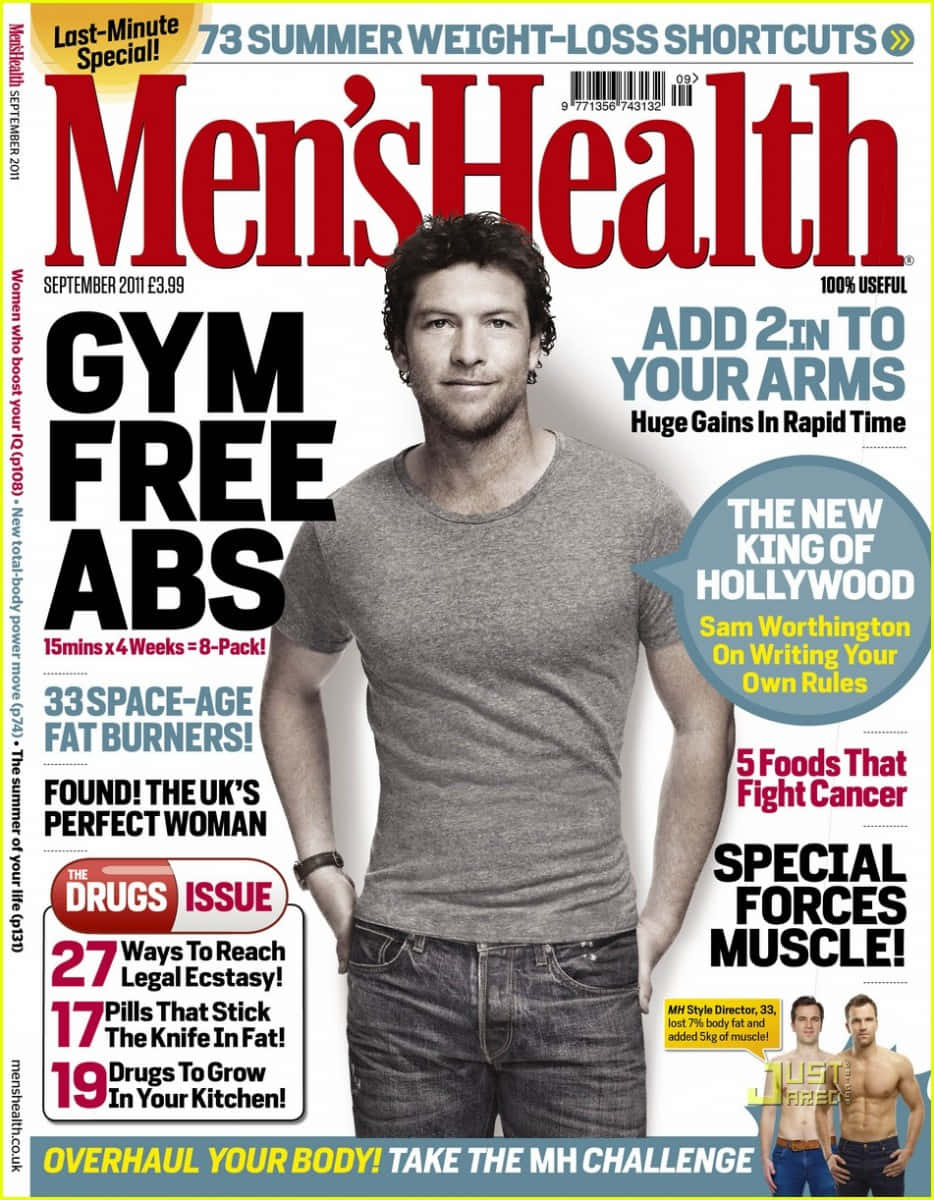 Magazine 桌布 壁紙 — 一位肌肉發達的男子穿著灰色T恤和牛仔褲，自信地擺姿勢在Men's Health雜誌封面上，周圍環繞著大膽的健身標題。