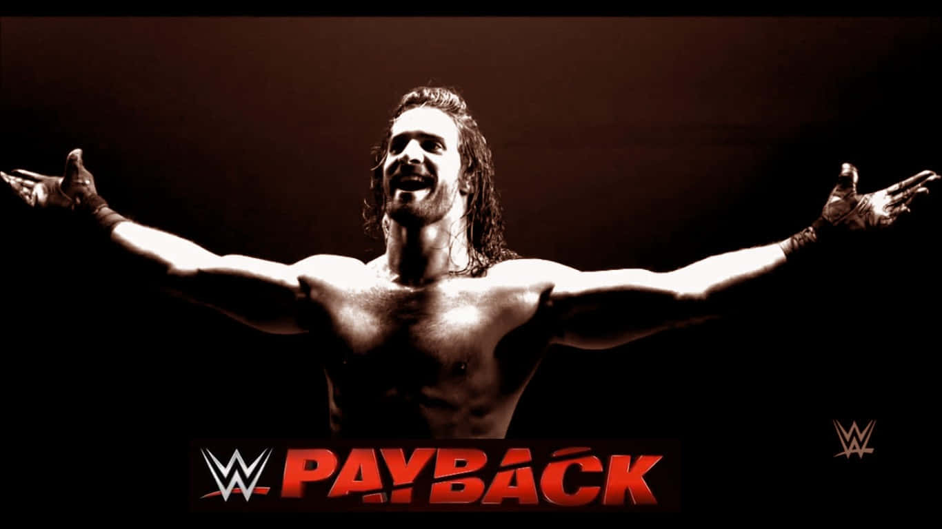 WWE 桌布 壁紙 — 一位肌肉發達的長髮摔角選手在黑暗背景的戲劇性燈光下，張開雙臂勝利地站立。
